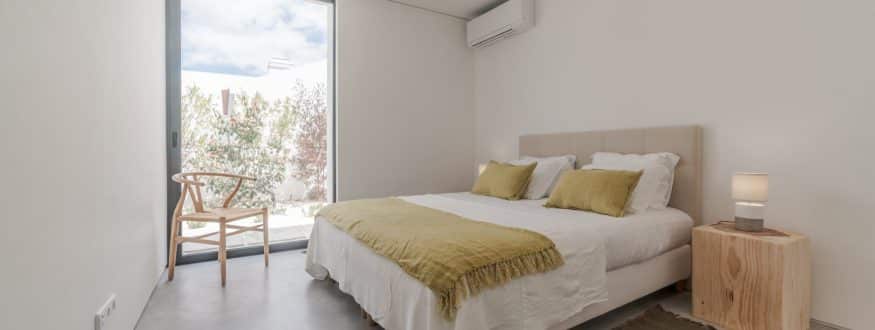 bedroom in modern villa with pool and deck 2024 10 13 20 13 37 utc scaled 875x330 1